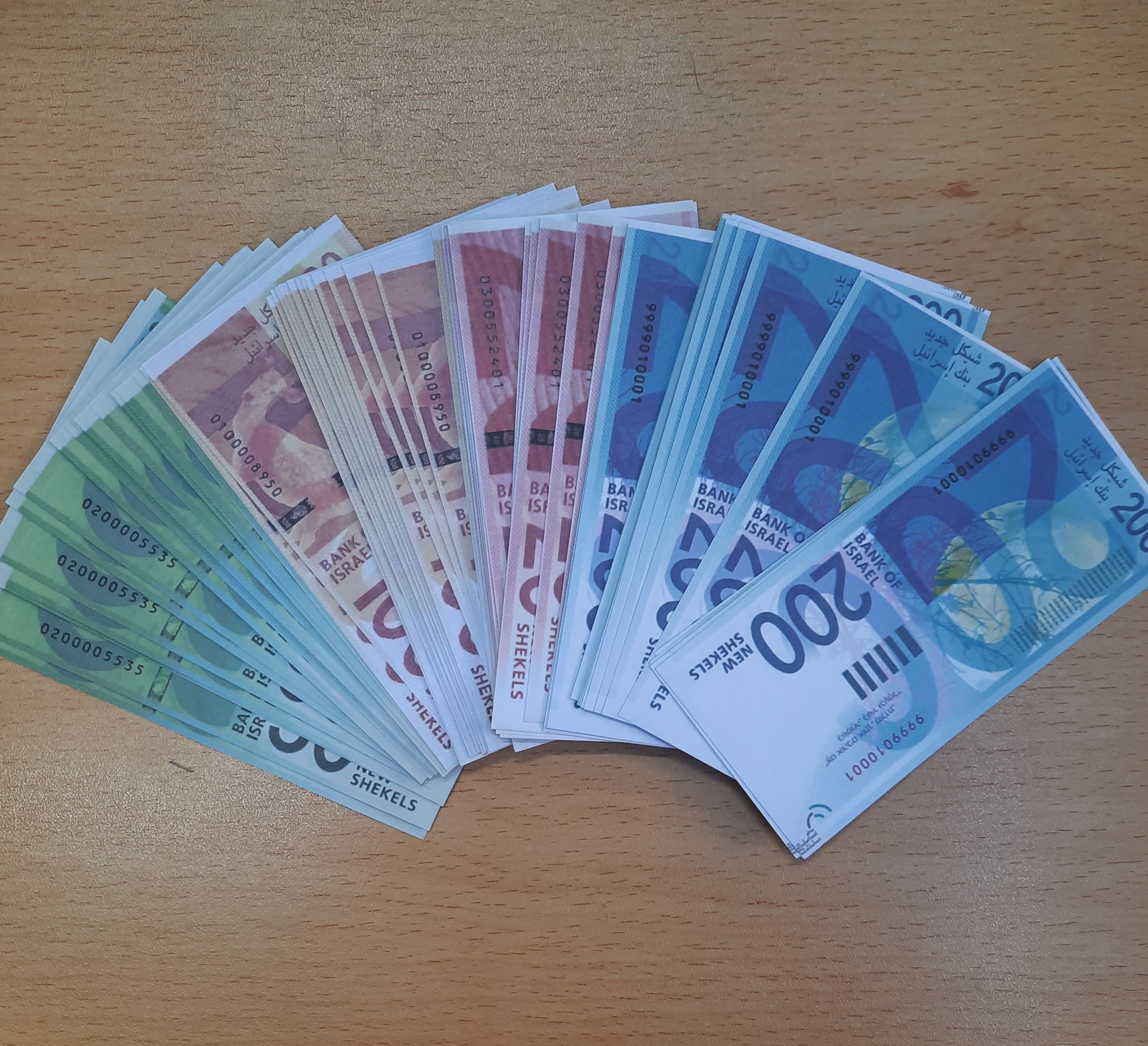 שטרות כסף מזוייף משחק 100 בשקית